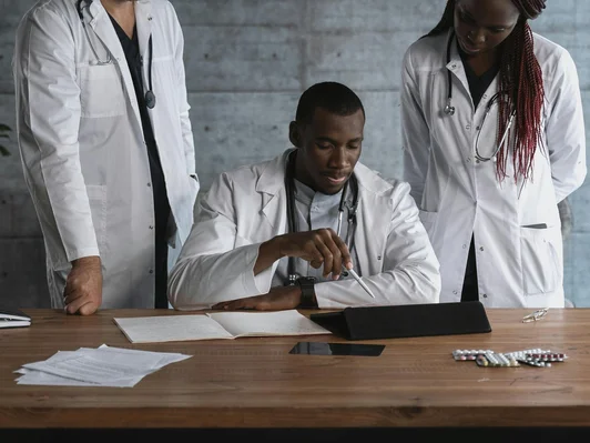 Doctors having discussion on the table