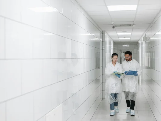 men and women walking in the gallery